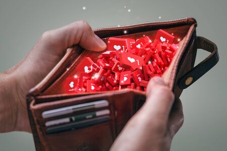 Wallet containing social media likes instead of moneyの写真素材
