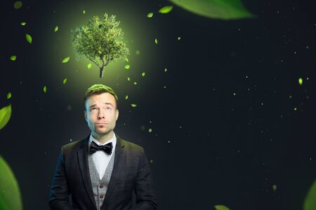 Well-dressed man with environmental awarenessの写真素材