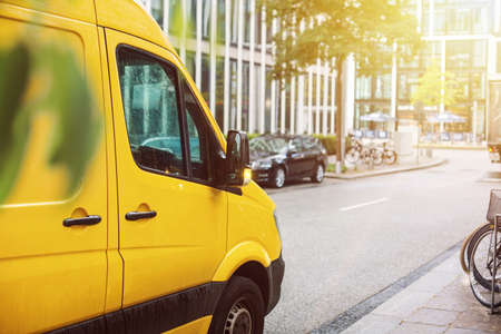 Delivery van standing in a cityの写真素材
