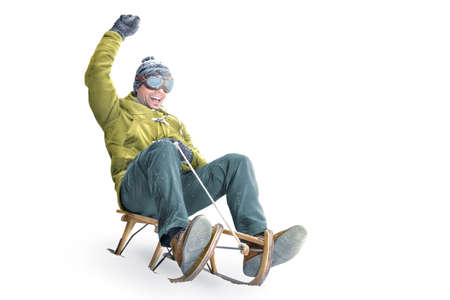 Cheering man riding a sled - isolated on whiteの写真素材