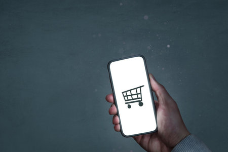 Smartphone screen with a shopping symbolの写真素材