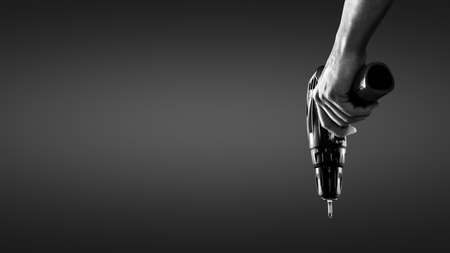 Hand holding a cordless screwdriverの写真素材