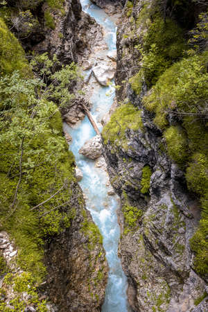 Top view of a natural mountain stream in the Dolomite Alpsの写真素材