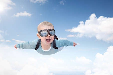 Baby skydiver flying through the sky