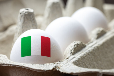 Egg with Italian flag in egg cartonの写真素材