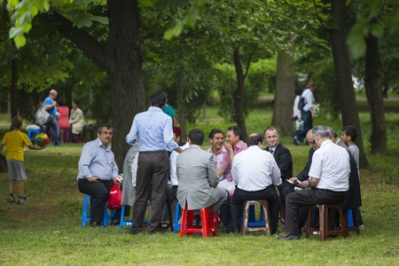 BUCHAREST, ROMANIA - MAY 17: Unidentified group of people  gather, relax and socialize in the park during the celebratory event Turkish Festival on May 17, 2013 in Bucharest, Romania.のeditorial素材