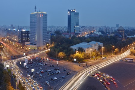 BUCHAREST, ROMANIA - OCTOBER 13: Victory Square at nightfall on October 13, 2013 in Bucharest, Romania. The famous Grigore Antipa National Museum of Natural History is located across the square.のeditorial素材