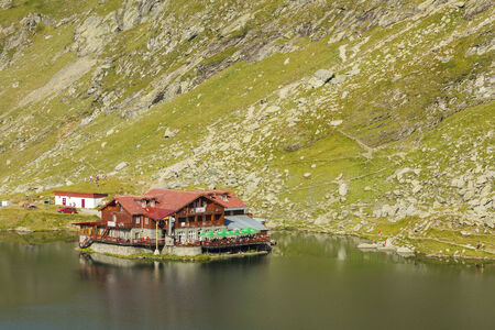 BALEA LAKE RESORT, ROMANIA - AUGUST 24  Balea Lake chalet on August 24, 2011 in Balea Lake Resort, Romania  It is situated near Balea glacier lake at 2,034 m altitude in the Fagaras Mountains のeditorial素材