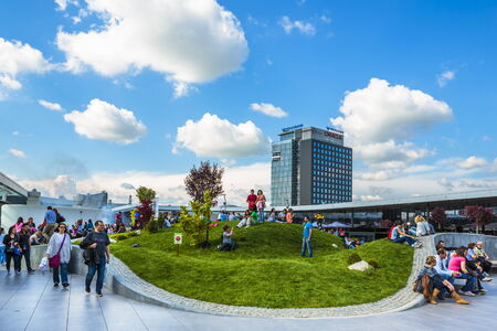 BUCHAREST, ROMANIA - MAY 1: Unidentified people relax at recreation area in Promenada Mall on May 1, 2014 in Bucharest, Romania. The mall received Building of the Year SEE 2014 at CEEQA Gala, Warsaw.のeditorial素材