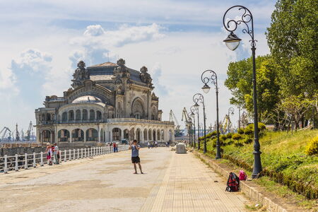 CONSTANTA, ROMANIA - MAY 27: Unidentified people enjoy a sunny day on old Casino sea wall on May 27, 2014 in Constanta, Romania. Casino is one of the most representative symbols of the city.のeditorial素材