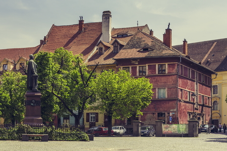 SIBIU, ROMANIA - 06 MAY, 2015: Huet Square, one of the three beautiful squares in the historical center of the Upper Town of Sibiu city, Transylvania region.のeditorial素材