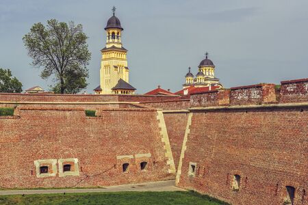 ALBA IULIA, ROMANIA - MAY 6, 2015: The Coronation Orthodox Cathedral towers and steeples as seen...