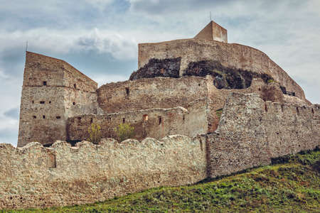 Rupea, Romania - October 10, 2015: Fortification walls of the medieval Rupea citadel, first attested in 1324, one of the oldest archaeological sites in Romania.のeditorial素材