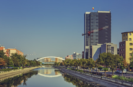 Bucharest, Romania - August 14, 2013: Picturesque city view with Dambovita river passing through Grozavesti district.のeditorial素材