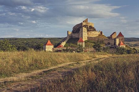 Rupea, Romania - July 21, 2016: Medieval Rupea citadel, first attested in 1324, is one of the oldest archaeological sites in Romania and is visited each month by more than 10,000 tourists.のeditorial素材