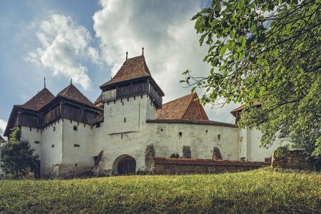 Viscri, Romania - July 21, 2016:  Southeast wall of the Viscri fortified church built by the ethnic German Transylvanian Saxon community, a Lutheran church .のeditorial素材