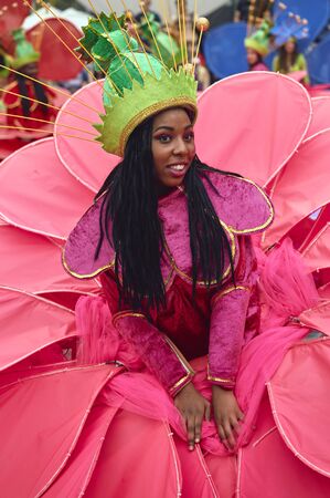 Bucharest, Romania - May 29, 2014: Smiling Hispanic female dancer in exotic vivid carnival outfit...