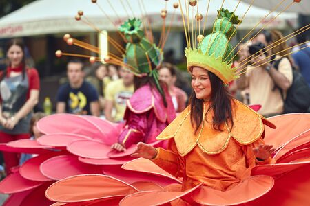 Bucharest, Romania - May 29, 2014: Female dancers in large exotic colorful costumes present The...