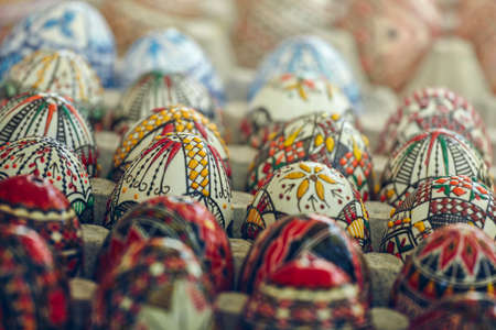 Beautiful colorful homemade ornate, painted decorative Easter eggs. Closeup, shallow depth of field, selective focus.の写真素材