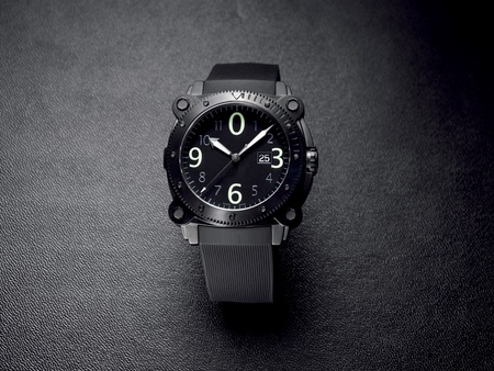 Gents wrist watch on dark textured backgroundの写真素材