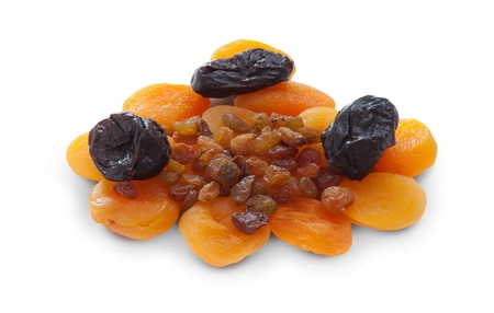 Apricots prunes and raisins on a whiteの写真素材