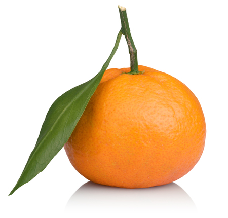 Tangerine with leaves isolated on a white backgroundの写真素材