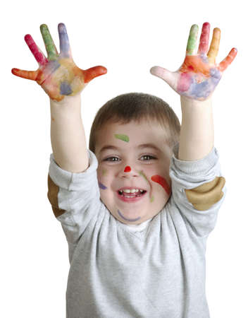 happy little boy with paints on palms isolated on white backgroundの写真素材
