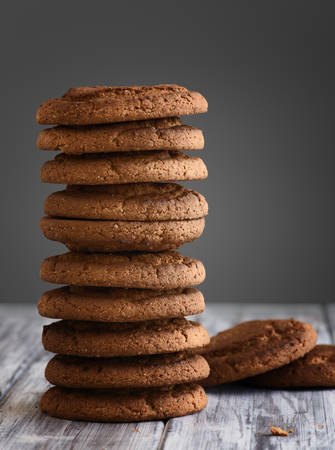 Oatmeal cookies on a wooden table close upの写真素材