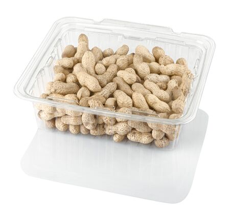 peanuts groundnuts in a transparent plastic box isolated on a white background with clipping pathの写真素材