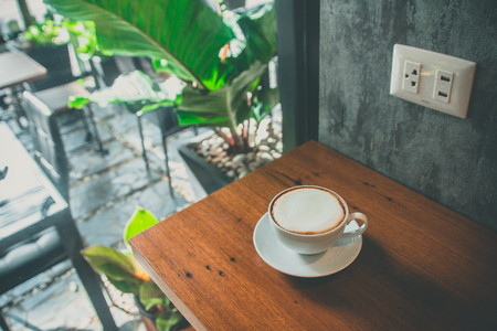 hot coffee on the table at coffee shop in thailandの写真素材