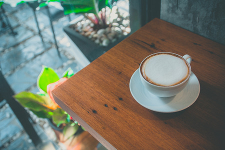 hot coffee on the table at coffee shop in thailandの写真素材