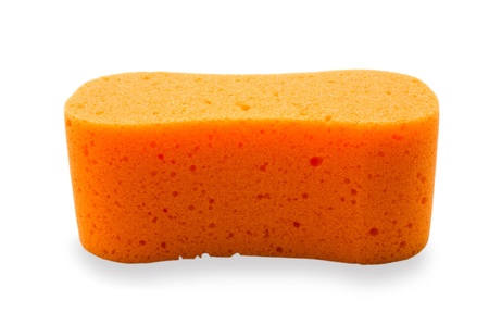 Orange sponge isolated on whiteの写真素材