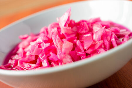 Red sauerkraut with beets in a bowlの写真素材