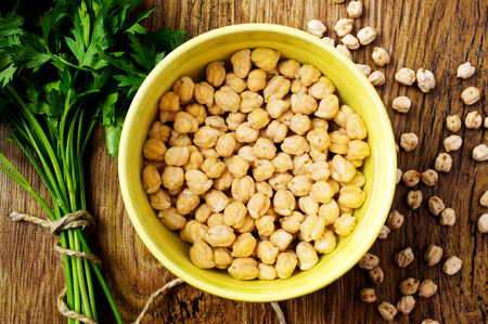 Chickpeas soaked in water in a bowlの写真素材