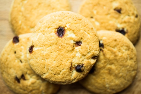 Shortbread cookies with raisins a few pieces on the tableの写真素材