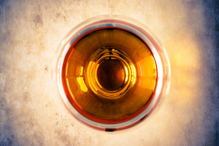 Cognac, brandy in the glass top viewの写真素材