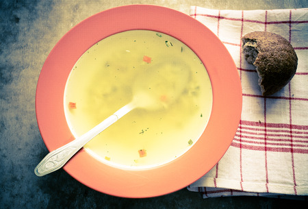 Noodle soup in a bowl with a spoon. Top viewの写真素材