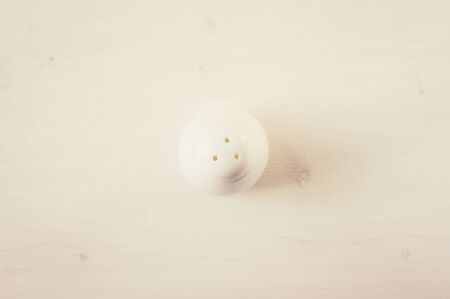 Salt cellar on white table top viewの写真素材