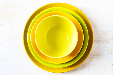 Colorful stack of plates for the concept backgroundの写真素材