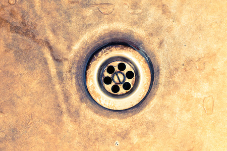 Drain old rusty sink for backgroundの写真素材