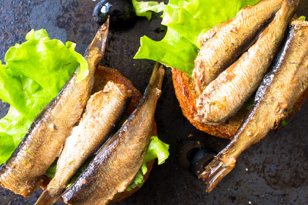 Tapas bun burger with smoked sardines or spratsの写真素材