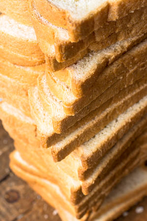 Toast bread slices to a lot of background