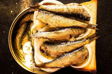 Tapas with sardines or sprats on canned fish