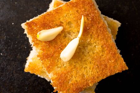 Tapas with garlic cloves top viewの写真素材