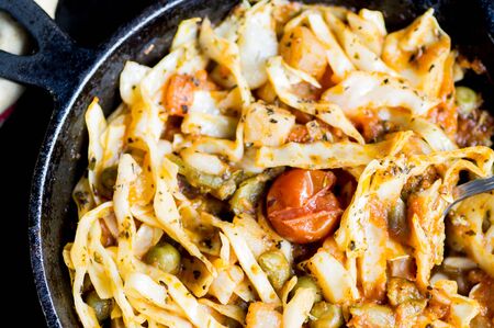 Braised cabbage with vegetables and tomato sauceの写真素材