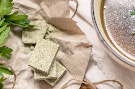 Bouillon cubes on paper a top rusticの写真素材