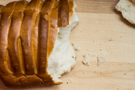 Break off a piece of loaf top view