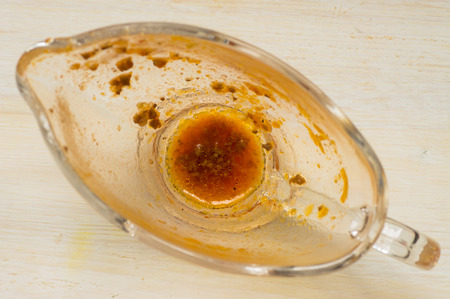 Bolognese sauce in a gravy boat residues leftovers top viewの写真素材