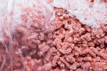Minced beef frozen in pack closeup top viewの写真素材