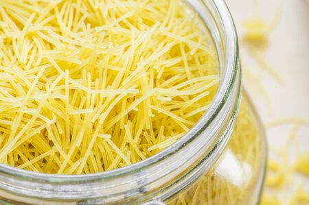 Vermicelli pasta in a glass jar closeupの写真素材